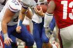 OXFORD, MS - SEPTEMBER 22: Tim Tebow #15 of the Florida Gators runs against the Mississippi Rebels on September 22, 2007 at Vaught-Hemingway Stadium/Hollingsworth Field in Oxford, Mississippi. Florida won  30-24. (Photo by Joe Murphy/Getty Images)