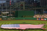 PITTSBURGH - JULY 11:  An American flag in the shape of the U.S.A. is displayed on the field before the 77th MLB All-Star Game at PNC Park on July 11, 2006 in Pittsburgh, Pennsylvania.  (Photo by Jamie Squire/Getty Images)
