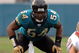 Jacksonville Jaguars linebacker Mike Peterson sets on defense against the San Francisco 49ers December 18, 2005 in Jacksonville. The Jaguars defeated the 49ers 10 - 9. (Photo by Al Messerschmidt/Getty Images)