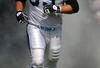 CHARLOTTE, NC - SEPTEMBER 28:  Offensive left tackle Jordan Gross #69 of the Carolina Panthers runs out of the tunnel during introductions before the game against the Atlanta Falcons at Bank of America Stadium on September 28, 2008 in Charlotte, North Carolina. The Carolina Panthers won the game 24-9. (Photo by Steve Dykes/Getty Images)