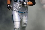 CHARLOTTE, NC - SEPTEMBER 28:  Offensive left tackle Jordan Gross #69 of the Carolina Panthers runs out of the tunnel during introductions before the game against the Atlanta Falcons at Bank of America Stadium on September 28, 2008 in Charlotte, North Carolina. The Carolina Panthers won the game 24-9. (Photo by Steve Dykes/Getty Images)