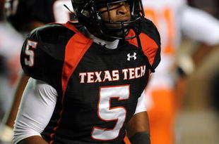 LUBBOCK, TX - NOVEMBER 08:  Wide receiver Michael Crabtree #5 of the Texas Tech Red Raiders during play against the Oklahoma State Cowboys at Jones AT&T Stadium on November 8, 2008 in Lubbock, Texas.  (Photo by Ronald Martinez/Getty Images)