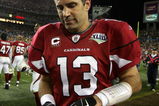 TAMPA, FL - FEBRUARY 01:  Kurt Warner #13 of the Arizona Cardinals takes his gloves off as he leaves the field after the Cardinals lost 27-23 against the Pittsburgh Steelers during Super Bowl XLIII on February 1, 2009 at Raymond James Stadium in Tampa, Florida.  (Photo by Al Bello/Getty Images)