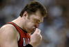 DALLAS - MAY 4:  Arvydas Sabonis #11 of the Portland Trail Blazers removes his mouth guard in Game seven of the Western Conference Quarterfinals against the Dallas Mavericks during the 2003 NBA Playoffs at American Airlines Center on May 4, 2003 in Dallas, Texas.  The Mavericks won 107-95.  NOTE TO USER: User expressly acknowledges and agrees that, by downloading and/or using this Photograph, User is consenting to the terms and conditions of the Getty Images License Agreement. (Photo by Brian Bahr/Getty Images) 