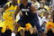 MILWAUKEE - FEBRUARY 25: Jeff Adrien #4 of the Connecticut Huskies moves against Wesley Matthews #23 of the Marquette Golden Eagles on February 25, 2009 at the Bradley Center in Milwaukee, Wisconsin. Connecticut defeated Marquette 93-82. (Photo by Jonathan Daniel/Getty Images)