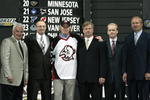 NASHVILLE, TN - JUNE 21:  (L to R) Sabers owner Thomas B. Golisano, Don Luce, Thomas Vanek, Jim Benning, general manager Darcy Regier and head coach Lindy Ruff of the Buffalo Sabres pose for a portrait on stage during the 2003 NHL Entry Draft at the Gaylord Entertainment Center on June 21, 2003 in Nashville, Tennessee. (Photo by Elsa/Getty Images/NHLI)