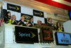 NEW YORK - DECEMBER 03:  2008 NASCAR Sprint Cup Series Champion winner Jimmie Johnson (4L), driver of the #48 Lowe's Chevrolet, attends the opening bell with (L-R) Miss Sprint Anne-Marie Rhodes, team owner Rick Hendricks, Chairmen and CEO of Lowe's Robert Niblock, Sprint's Chief Financial Officer Bob Brust, crew chief Chad Knaus and Miss Sprint Monica Palumbo at the New York Stock Exchange on December 3, 2008 in New York City.  (Photo by Chris Trotman/Getty Images for NASCAR)