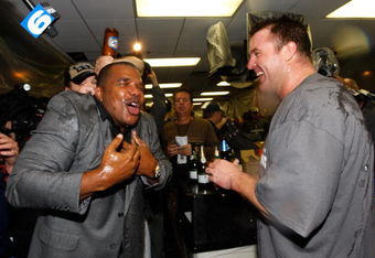 CHICAGO - SEPTEMBER 30:  (L-R)  General manager Kenny Williams and Jim Thome #25 of the Chicago White Sox celebrate in the locker room against the Minnesota Twins during the American League Central Division Tiebreaker game at U.S. Cellular Field on September 30, 2008 in Chicago, Illinois.  (Photo by Jamie Squire/Getty Images)