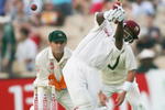 ADELAIDE, AUSTRALIA - NOVEMBER 25:  Brian Lara of the West Indies hits out during day one of the Third Test between Australia and the West Indies played at the Adelaide Oval on November 25, 2005 in Adelaide, Australia.   (Photo by Hamish Blair/Getty Images)