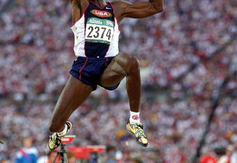GEORGIA, US - JULY 29:  Carl Lewis of the USA makes the winning Long Jump 8.50ft during the 1996 Olympic Games at the Olympic Stadium July 29, 1996 in Atlanta, Georgia. (Photo by Mike Powell/Getty Images) 