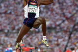 GEORGIA, US - JULY 29:  Carl Lewis of the USA makes the winning Long Jump 8.50ft during the 1996 Olympic Games at the Olympic Stadium July 29, 1996 in Atlanta, Georgia. (Photo by Mike Powell/Getty Images) 