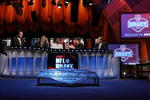 NEW YORK - APRIL 26:  The ESPN broadcast team of (L-R) Mel Kiper, Chris Mortensen,Keyshawn Johnson, Steve Young and Chris Berman work the 2008 NFL Draft on April 26, 2008 at Radio City Music Hall in New York City.  (Photo by Jim McIsaac/Getty Images)