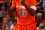 NEW YORK - MARCH 14:  Jonny Flynn #10 of the Syracuse Orange reacts to a call while playing against the Louisville Cardinals during the championship game of the Big East Tournament at Madison Square Garden on March 14, 2009 in New York City.  (Photo by Jim McIsaac/Getty Images)