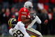 COLUMBUS, OH - NOVEMBER 18:  Ted Ginn Jr. of the Ohio State Buckeyes makes a reception for a 39-yard touchdown in the second quarter against Leon Hall #29 of the Michigan Wolverines November 18, 2006 at Ohio Stadium in Columbus, Ohio. The touchdown gave the Buckeyes a 21-7 lead.  (Photo by Gregory Shamus/Getty Images)