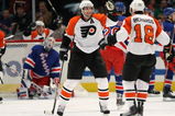 NEW YORK - MARCH 15: Simon Ggane #12 of the Philadelphia Flyers celebrates his power play goal at 4:32 of the second period against the New York Rangers on March 15, 2009 at Madison Square Garden in New York City. (Photo by Bruce Bennett/Getty Images)
