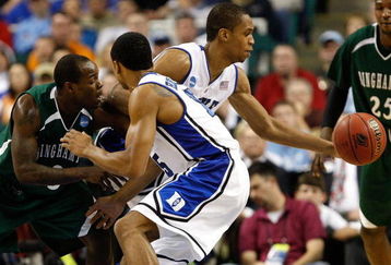GREENSBORO, NC - MARCH 19:  Lance Thomas #42 of the Duke Blue Devils grabs a loose ball against Malik Alvin #3 of the Binghamton Bearcats and Gerald Henderson #15 during the first round of the NCAA Division I Men's Basketball Tournament at the Greensboro Coliseum on March 19, 2009 in Greensboro, North Carolina.  (Photo by Streeter Lecka/Getty Images)