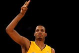 LOS ANGELES - MARCH 17:  Trevor Ariza #3 of the Los Angeles Lakers celebrates after making a three point basket against the Philadelphia 76ers on March 17, 2009 at Staples Center in Los Angeles, California. The 76ers won 94-93.   NOTE TO USER: User expressly acknowledges and agrees that, by downloading and/or using this Photograph, user is consenting to the terms and conditions of the Getty Images License Agreement. (Photo by Stephen Dunn/Getty Images)