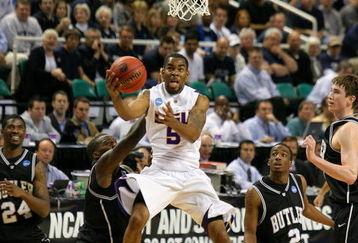 GREENSBORO, NC - MARCH 19:  Marcus Thornton #5 of the Louisiana State University Tigers drives through the defense of the Butler Bulldogs during the first round of the NCAA Division I Men's Basketball Tournament at the Greensboro Coliseum on March 19, 2009 in Greensboro, North Carolina.  (Photo by Streeter Lecka/Getty Images)