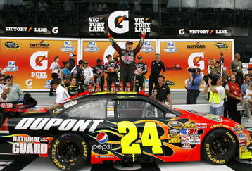 DAYTONA BEACH, FL - FEBRUARY 12: Jeff Gordon, driver of the #24 DuPont Chevrolet, celebrates in victory lane after winning the NASCAR Sprint Cup Series Gatorade Duel 1 at Daytona International Speedway on February 12, 2009 in Daytona Beach, Florida.  (Photo by Geoff Burke/Getty Images for NASCAR)