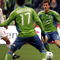 SEATTLE - MARCH 19: Fredy Montero #17 of the Seattle Sounders FC positions himself to receive a pass from teammate Brad Evans #3 in the first half of their opening match at Qwest Field March 19, 2009 in Seattle, Washington. The Sounders defeated the Red Bulls 3-0. (Photo by Robert Giroux/Getty Images)
