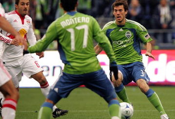 SEATTLE - MARCH 19:  Fredy Montero #17 of the Seattle Sounders FC positions himself to receive a pass from teammate Brad Evans #3 in the first half of their opening match at Qwest Field March 19, 2009 in Seattle, Washington.  The Sounders defeated the Red Bulls 3-0.  (Photo by Robert Giroux/Getty Images)