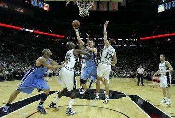 SAN ANTONIO - MAY 30:  Matt Harpring #15 of the Utah Jazz goes up for a shot against Francisco Elson #16 and Brent Barry #17 of the San Antonio Spurs in the fourth quarter of Game Five of the Western Conference Finals during the 2007 NBA Playoffs at AT&T Center on May 30, 2007 in San Antonio, Texas. NOTE TO USER: User expressly acknowledges and agrees that, by downloading and or using this photograph, User is consenting to the terms and conditions of the Getty Images License Agreement.  (Photo by Lisa Blumenfeld/Getty Images)