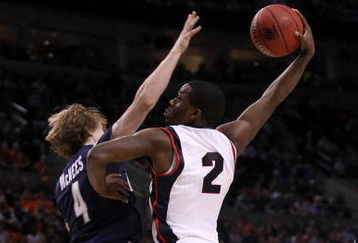 PORTLAND, OR - MARCH 19:  Jeremy Pargo #2 of the Gonzaga Bulldogs goes up for a dunk over Steve McNees #4 of the Akron Zips in the second half during the first round of the NCAA Division I Men's Basketball Tournament at the Rose Garden on March 19, 2009 in Portland, Oregon.  (Photo by Jonathan Ferrey/Getty Images)