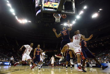 KANSAS CITY, MO - MARCH 19:  Beau Gerber #45 of the Oklahoma Sooners watches his shot as John Long #44 of the Morgan State Golden Bears looks for the rebound in the second half during the first round of the NCAA Division I Men's Basketball Tournament at the Sprint Center on March 19, 2009 in Kansas City, Missouri. The Sooners defeated the Golden Bears 82-54.  (Photo by Jamie Squire/Getty Images)