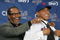 LONG ISLAND CITY, NY - DECEMBER 17:  New York Mets Manager Jerry Manuel helps Francisco Rodriquez put on a Mets jersey for the first time during a press conference to introduce him on December 17, 2008 at the Citigroup Building in New York City.  (Photo by Mike Stobe/Getty Images)