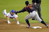 SAN DIEGO - MARCH 19: Taek Keun Lee #29 of Korea slides into second base against Akinori Iwamura #8 of Japan during the 2009 World Baseball Classic Round 2 Pool 1 Game 6 on March 19, 2009 at Petco Park in San Diego, California.  (Photo by Kevork Djansezian/Getty Images)