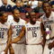 PHILADELPHIA - MARCH 19:  (L-R) A.J. Price #12, Scottie Haralson #30, Kemba Walker #15 and Hasheem Thabeet #34 of the Connecticut Huskies share a laugh from the bench during the game against the Chattanooga Mocs during the first round of the NCAA Division I Men's Basketball Tournament at the Wachovia Center on March 19, 2009 in Philadelphia, Pennsylvania.  (Photo by Jim McIsaac/Getty Images)