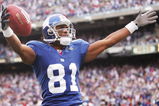EAST RUTHERFORD, NJ - NOVEMBER 13:  Amani Toomer #81 of the New York Giants scores a touchdown against the Minnesota Vikings during their game at Giants Stadium on November 13, 2005 in East Ruhterford, New Jersey.  (Photo by Al Bello/Getty Images)