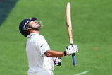 HAMILTON, NEW ZEALAND - MARCH 20:  Sachin Tendulkar of India raises his bat at looks skyward after scoring 150 runs during day three of the First Test match between New Zealand and India at Seddon Park on March 20, 2009 in Hamilton, New Zealand.  (Photo by Sandra Mu/Getty Images)