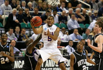 GREENSBORO, NC - MARCH 19:  Marcus Thornton #5 of the Louisiana State University Tigers drives through the defense of the Butler Bulldogs during the first round of the NCAA Division I Men's Basketball Tournament at the Greensboro Coliseum on March 19, 2009 in Greensboro, North Carolina.  (Photo by Streeter Lecka/Getty Images)