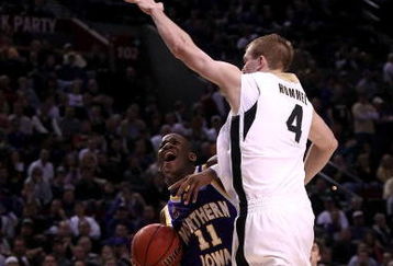 PORTLAND, OR - MARCH 19:  Kwadzo Ahelegbe #11 of the Northern Iowa Panthers goes up for a shot against Robbie Hummel #4 of the Purdue Boilermakers in the second half during the first round of the NCAA Division I Men's Basketball Tournament at the Rose Garden on March 19, 2009 in Portland, Oregon.  (Photo by Jonathan Ferrey/Getty Images)