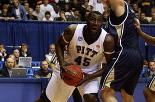 DAYTON, OH - MARCH 20: DeJuan Blair #45 of the Pittsburgh Panthers drives to the hoop against Mike Smith #1 of the East Tennessee State Buccaneers during the first round of the NCAA Division I Men's Basketball Tournament at the University of Dayton Arena on March 20, 2009 in Dayton, Ohio.  (Photo by Andy Lyons/Getty Images)