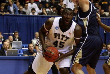 DAYTON, OH - MARCH 20: DeJuan Blair #45 of the Pittsburgh Panthers drives to the hoop against Mike Smith #1 of the East Tennessee State Buccaneers during the first round of the NCAA Division I Men's Basketball Tournament at the University of Dayton Arena on March 20, 2009 in Dayton, Ohio.  (Photo by Andy Lyons/Getty Images)