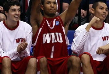 PORTLAND, OR - MARCH 19:  Sergio Kerusch #1 of the Western Kentucky Hilltoppers raises his arms on the bench late in the second half against the Illinois Fighting Illini during the first round of the NCAA Division I Men's Basketball Tournament at the Rose Garden on March 19, 2009 in Portland, Oregon. The Hilltoppers defeated the Illini 76-72.  (Photo by Jonathan Ferrey/Getty Images)