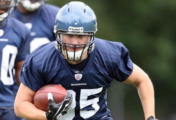 KIRKLAND, WA - JULY 25:  Owen Schmitt #35 of the Seattle Seahawks gets ready for the tackling dummies during training camp at the Seahawks Training Facility on July 25, 2008 in Kirkland, Washington. (Photo by Otto Greule Jr/Getty Images)