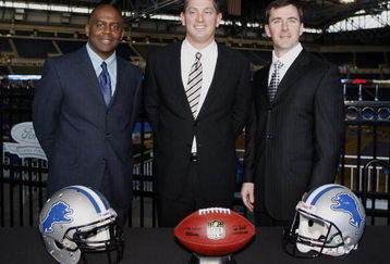 DETROIT , MI - JANUARY 16:  Jim Schwartz, center, head coach of the Detroit Lions poses with General Manager Martin Mayhew, left, and Tom Lewand team president after a press conference to introduce him as the Lions new head coach on January 16, 2009 at Ford Field in Detroit, Michigan.  (Photo by Gregory Shamus/Getty Images)
