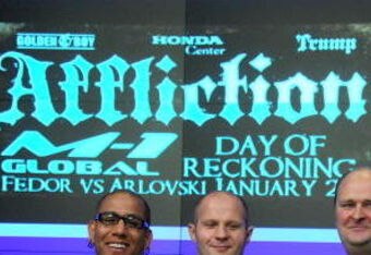 NEW YORK - JANUARY 20:  MMA fighter and former UFC light heavyweight champion Tito Ortiz, VP, Affliction Entertainment Tom Atencio and Fedor Vladimirovich Emelianenko, heavyweight mixed martial artist and current World Alliance of Mixed Martial Arts heavyweight champion rings the NASDAQ opening bell at NASDAQ in Times Square on January 20, 2009 in New York City.  (Photo by Joe Corrigan/Getty Images)