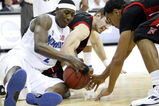 KANSAS CITY, MO - MARCH 19:  Robert Dozier #2 of the Memphis Tigers vies for a loose ball with Willie Galick #14 and Tremaine Townsend #33 of the CSUN Matadors in the first half during the first round of the NCAA Division I Men's Basketball Tournament at the Sprint Center on March 19, 2009 in Kansas City, Missouri.  (Photo by Jamie Squire/Getty Images)