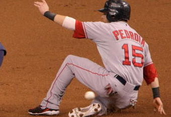 ST. PETERSBURG, FL - OCTOBER 10:  Dustin Pedroia #15 of the Boston Red Sox safely steals second base past infielder Jason Bartlett #8 of the Tampa Bay Rays in the eighth inning of game one of the American League Championship Series during the 2008 MLB playoffs at Tropicana Field on October 10, 2008 in St. Petersburg, Florida.  (Photo by Doug Pensinger/Getty Images)
