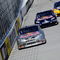 BRISTOL, TN - MARCH 20:  Scott Speed, driver of the #82 Red Bull Toyota leads Brian Vickers, driver of the #83 Red Bull Toyota and Michael Waltrip, driver of the #55 NAPA Toyota during practice for the NASCAR Sprint Cup Series Food City 500 at Bristol Motor Speedway on March 20, 2009 in Bristol, Tennessee.  (Photo by Rusty Jarrett/Getty Images)