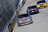 BRISTOL, TN - MARCH 20:  Scott Speed, driver of the #82 Red Bull Toyota leads Brian Vickers, driver of the #83 Red Bull Toyota and Michael Waltrip, driver of the #55 NAPA Toyota during practice for the NASCAR Sprint Cup Series Food City 500 at Bristol Motor Speedway on March 20, 2009 in Bristol, Tennessee.  (Photo by Rusty Jarrett/Getty Images)