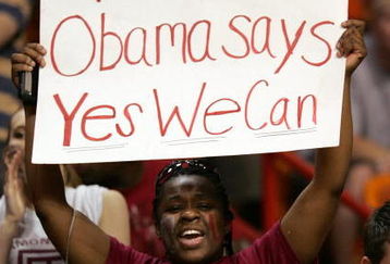 MIAMI - MARCH 20: A fan of the Temple Owls holds up a President Obama sign during the first round of the NCAA Division I Men's Basketball Tournament between the Owls and Arizona State Sun Devils at the American Airlines Arena on March 20, 2009 in Miami, Florida.  (Photo by Marc Serota/Getty Images)