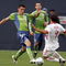 SEATTLE - MARCH 19: Sebastien Le Toux #9 of the Seattle Sounders FC races Carlos Mendes #4 of the New York Red Bulls to the ball in the first half of their opening match at Qwest Field March 19, 2009 in Seattle, Washington. The Sounders defeated the Red Bulls 3-0. (Photo by Robert Giroux/Getty Images)