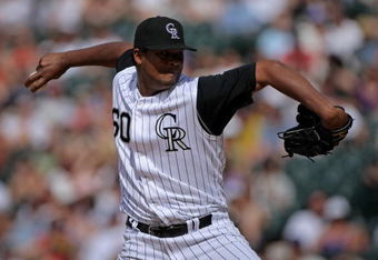 DENVER - MAY 18:  Pitcher Manny Corpas #60 of the Colorado Rockies delivers against the Minnesota Twins during Interleague MLB action at Coors Field on May 18, 2008 in Denver, Colorado. The Rockies defeated the Twins 6-2.  (Photo by Doug Pensinger/Getty Images)