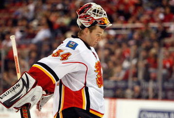 DETROIT - MARCH 12:  Miikka Kiprusoff #34 of the Calgary Flames looks on during the game against the Detroit Red Wings on March 12, 2009 at Joe Louis Arena in Detroit, Michigan. (Photo by Gregory Shamus/Getty Images)
