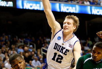 GREENSBORO, NC - MARCH 19:  Kyle Singler #12 of the Duke Blue Devils has the ball stripped from Chretien Lukusa #34 and Reggie Fuller #25 of the Binghamton Bearcats during the first round of the NCAA Division I Men's Basketball Tournament at the Greensboro Coliseum on March 19, 2009 in Greensboro, North Carolina.  (Photo by Streeter Lecka/Getty Images)